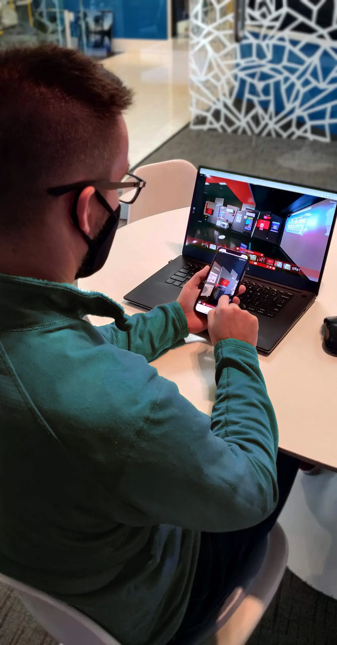 Boy Projecting An Image Onto The Laptop
